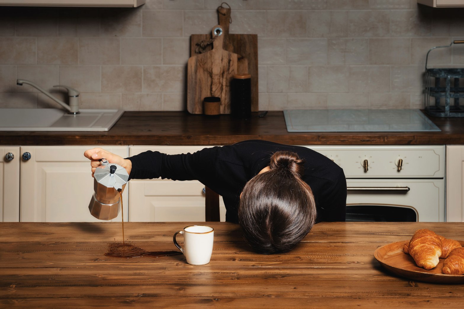 Disenchanted woman spilling coffee